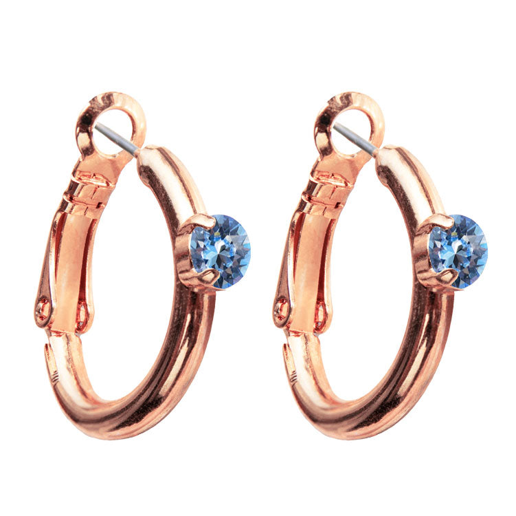Riņķa Swarovski auskari ar gaišā safīra kristāliem