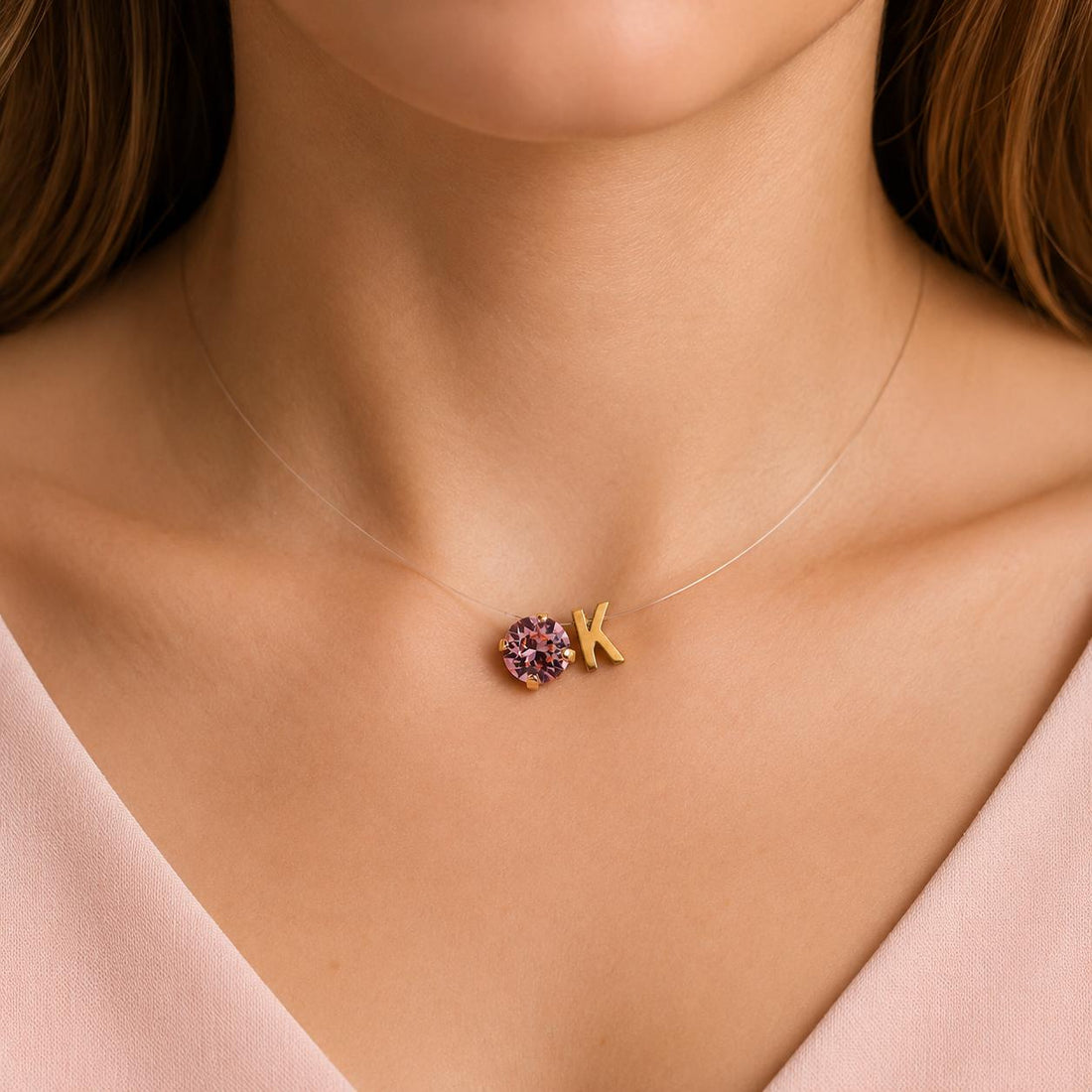 Invisible necklace with a letter